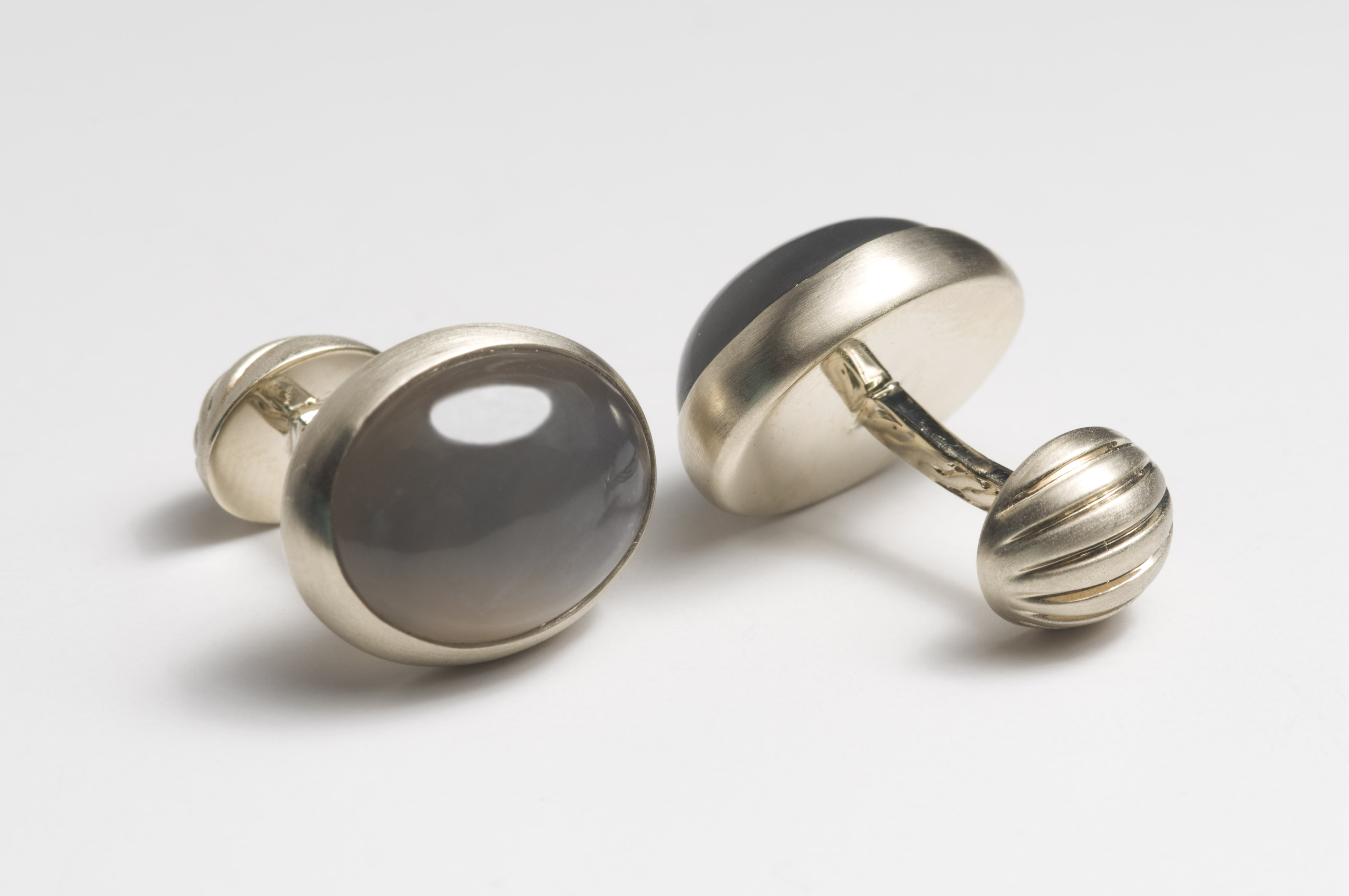 Grey moonstone oval cufflinks in white gold