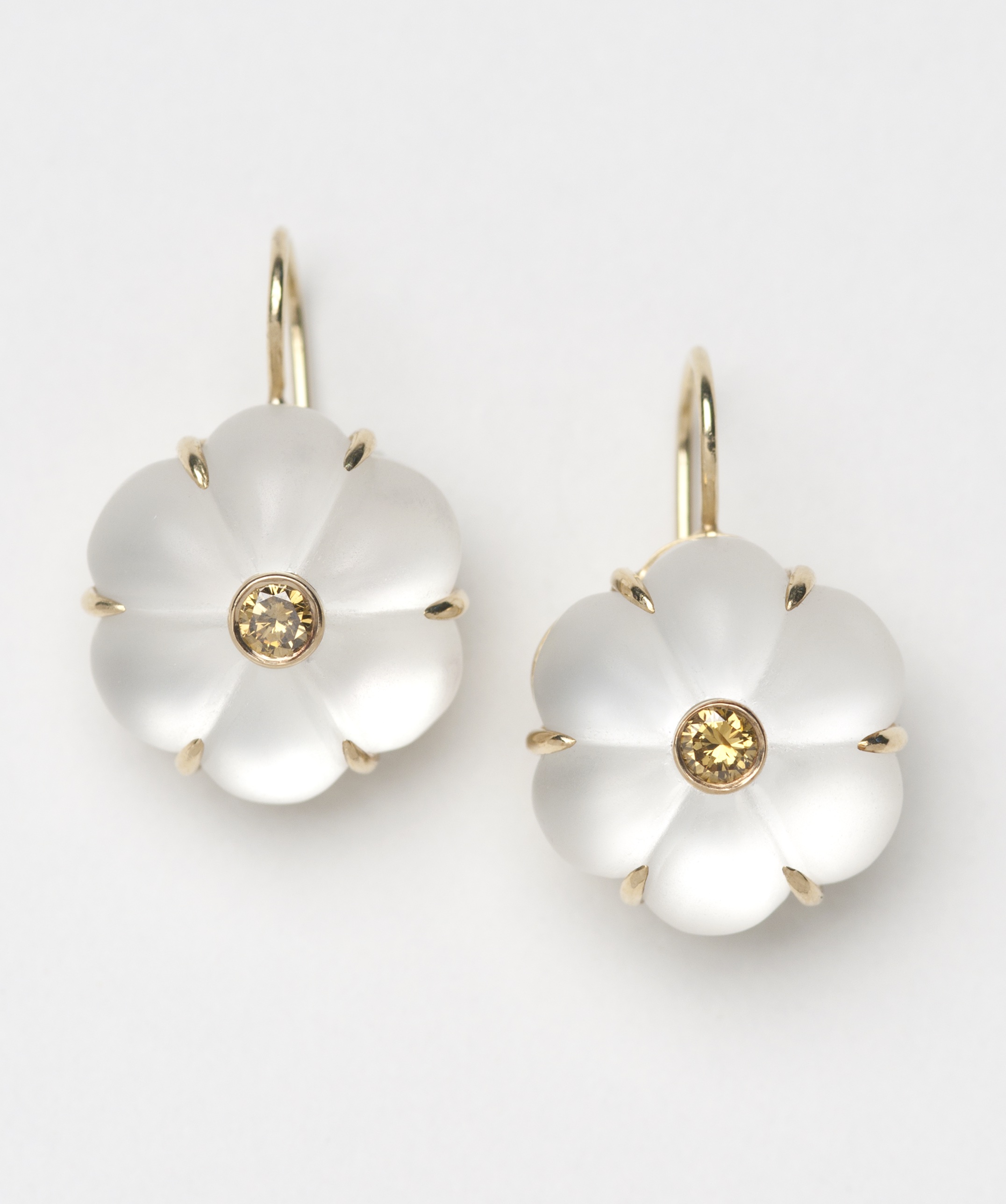 Rock crystal flower drop earrings with yellow diamond center in 18k gold